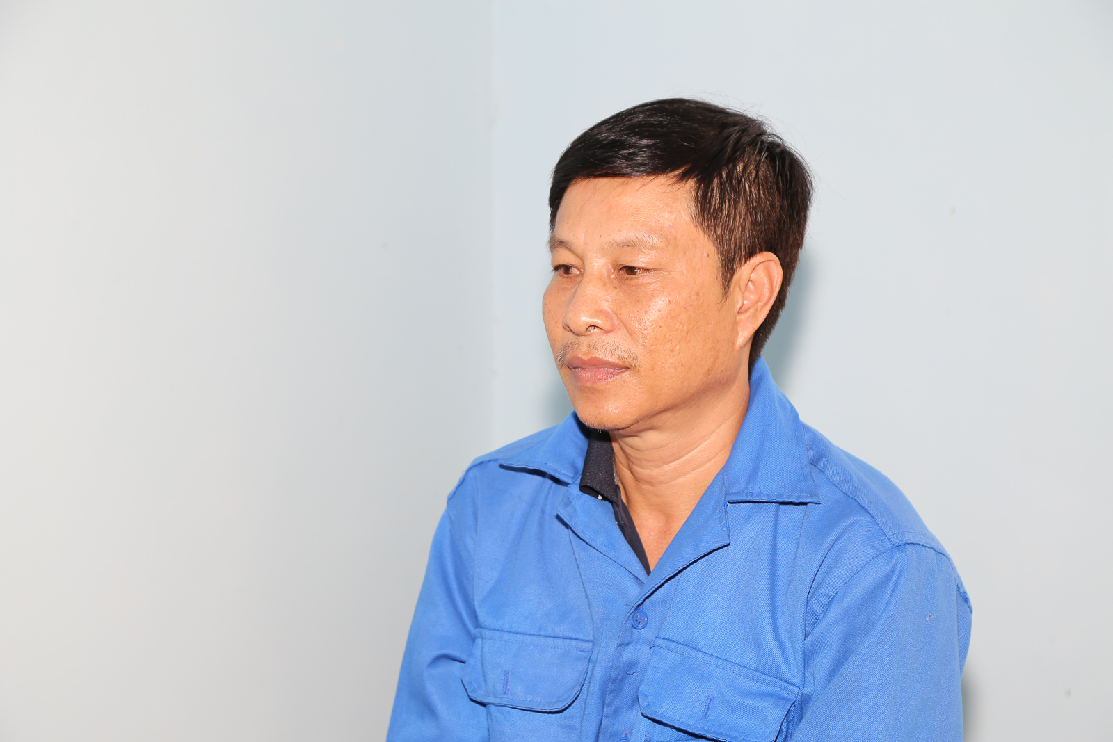 Đối tượng Nguyễn Tấn Phát tại cơ quan công an. Ảnh: ANH TUẤN